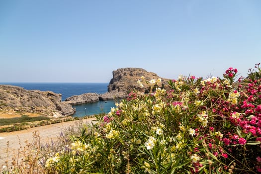 Scenic view at St. Pauls bay in Lindos on Rhodes island, Greece on a sunny day 