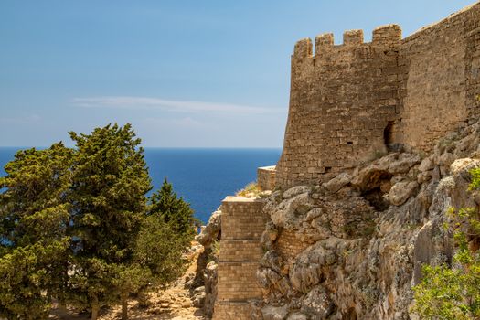 Ruins of the acropolis of Lindos on Rhodes island, Greece on a sunny day in spring