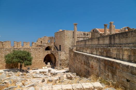 Ruins of the acropolis of Lindos on Rhodes island, Greece on a sunny day in spring