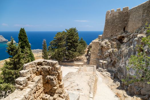 Ruins of the acropolis of Lindos on Rhodes island, Greece on a sunny day in spring