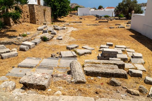 Field with ancient excavations in Lindos on Rhodes island, Greece