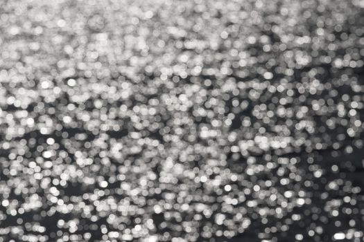 2 - Full frame plain abstract textured water bokeh round circles background. Random pattern effect of white circles on a dark grey background