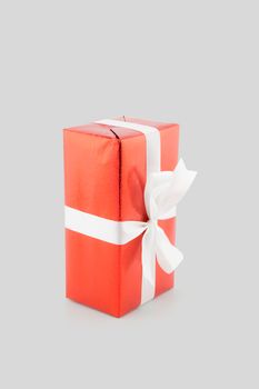 Red gift box white ribbon isolated on white background, using for christmas and new year or holiday other.