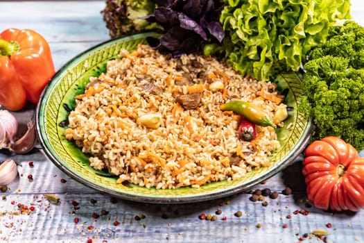 Traditional Asian food on an old wooden desk with different ingredients