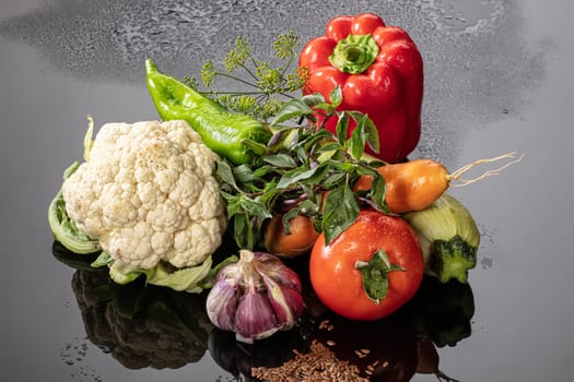 Still life with vegetables on a glass background