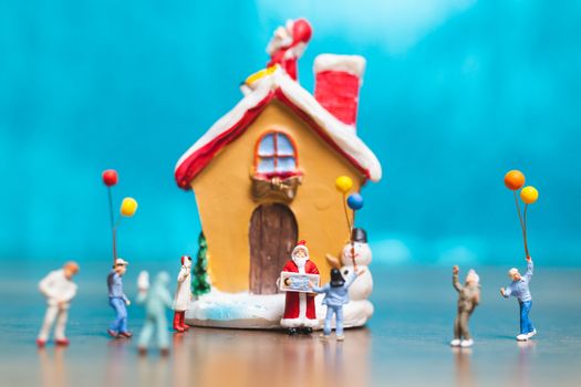 Miniature people, Happy family celebrating A Christmas  , Christmas and Happy New Year concept.