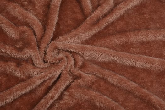 Abstract Artificial texture fur fabric, background, closeup. Fluffy material backdrop, kids toys faux fur.