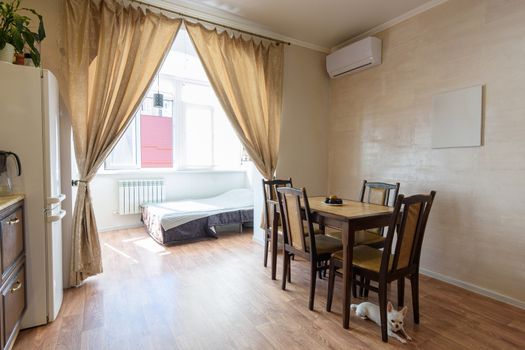 View of the living room together with the kitchen and also combined with the insulated balcony