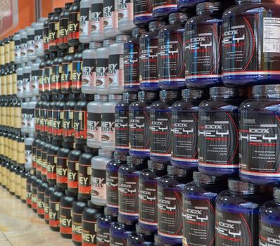 Tashkent, Uzbekistan - November 10, 2019 : Diversity of food supplements and sports nutrition products in the store