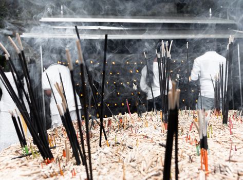Burning incense sticks is sacred offering in buddhism.