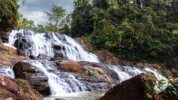 Waterfall in deniyaya moody dark sky landscape photography