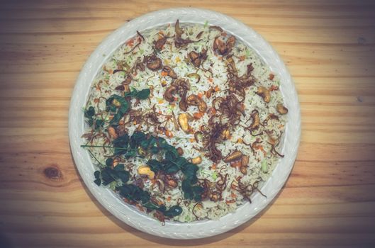 Basmati fried rice plate on a table top view