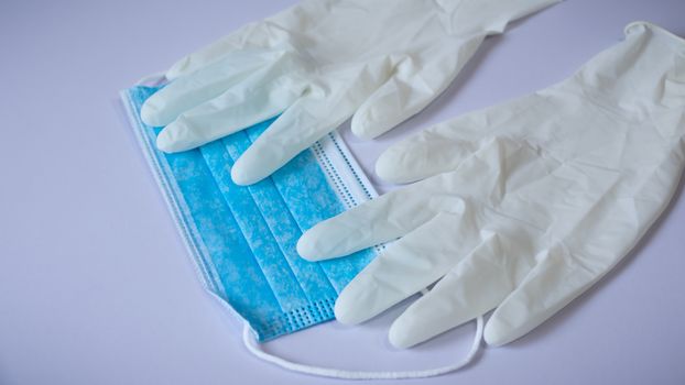 Medical face mask and pair of latex medical gloves