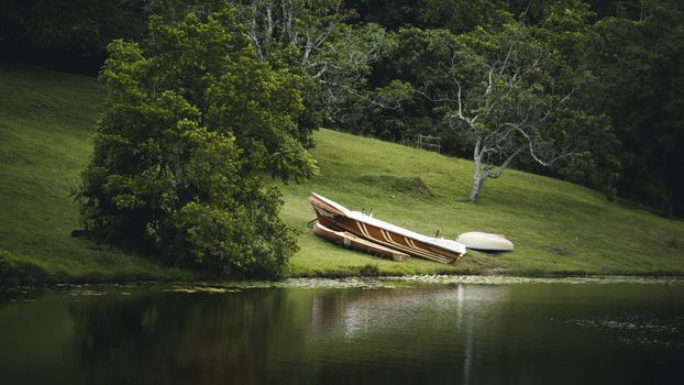 Beautiful landscape of Hiyare Reservoir boat on the ground reflection vibrant colors