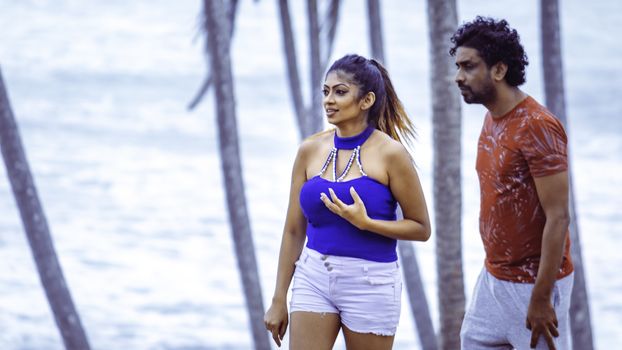 young beautiful Sri Lankan couple in beach location post covid situation