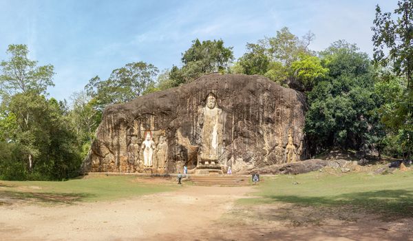 Buduruwagala Rock carvings heritage site, wide-angle photograph.