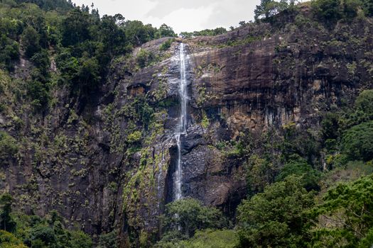 Diyaluma falls almost dried out, dry season in koslanda, from a long-distance photograph.