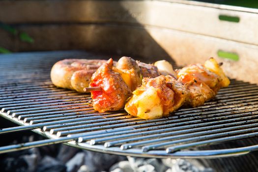 Grilled meat on a summer barbecue in the garden