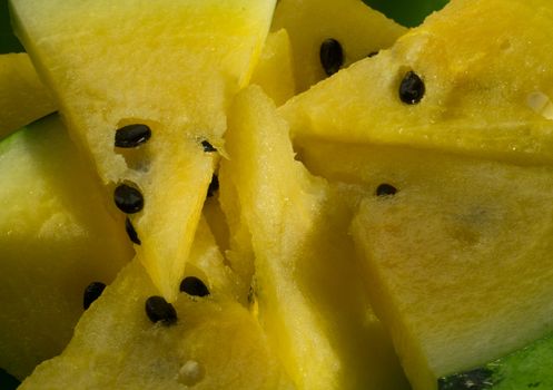 Yellow watermelon with slices and wedges for effective watermelon diet