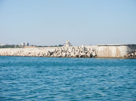 Wavecut on the auberezes at the port of Sevastopol. Fighting the waves, the Black Sea.