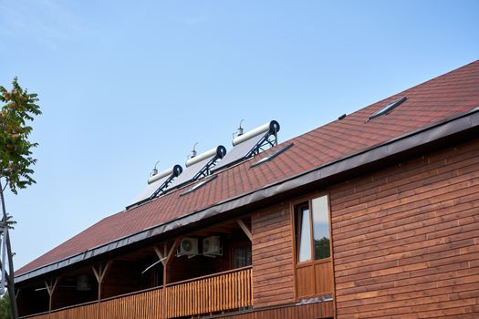 Solar water heating system Ecological economical panel boiling liquid Renewable recycling generate green power Alternative eco energy Installed on roof top