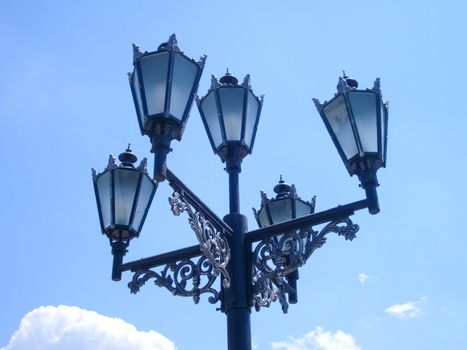 Street lights are made in the old style.