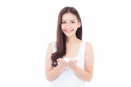 Asian of portrait beautiful young woman showing with healthy clean skin presenting something empty copy space on the hand isolated on white background, beauty concept.