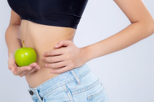 Closeup beautiful body woman sexy slim holding green apple with cellulite for wellness, girl waist thin with fitness for weight loss and healthy isolated on white background, healthcare and diet concept.