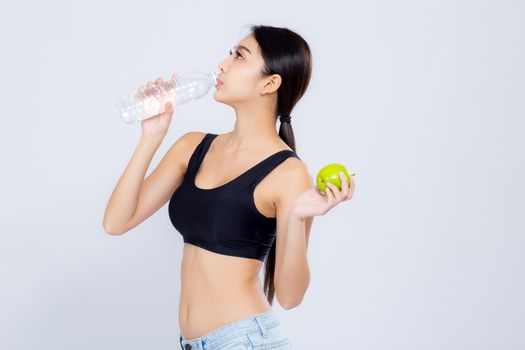Beautiful portrait asian young woman bottle of water and green apple for healthy isolated on white background, girl with fit thirsty after exercise and fitness, health concept.