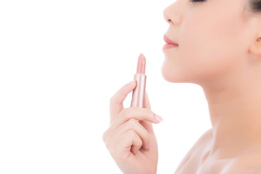 Beauty of portrait asian woman applying make up with lipstick of mouth isolated on white background, Beautiful girl on lips with happy, skincare and cosmetic concept.