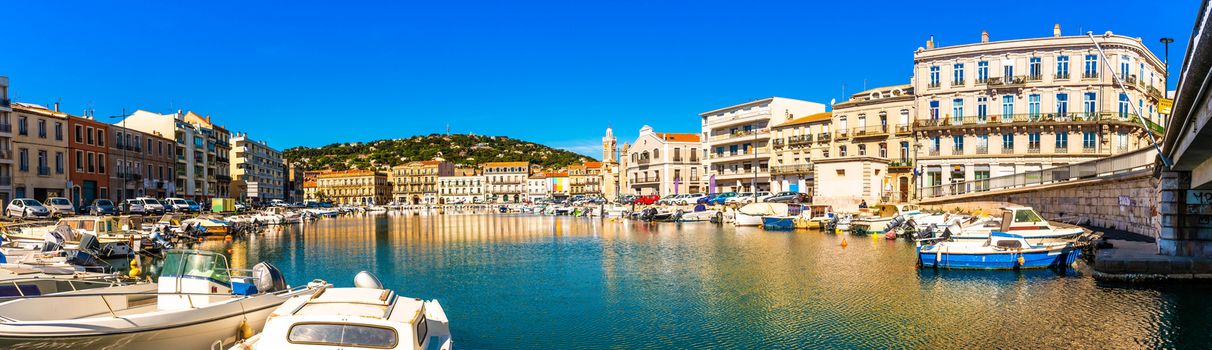 Alignment of small boats along the Peyrade canal in the city center of Sète, in the south of France.