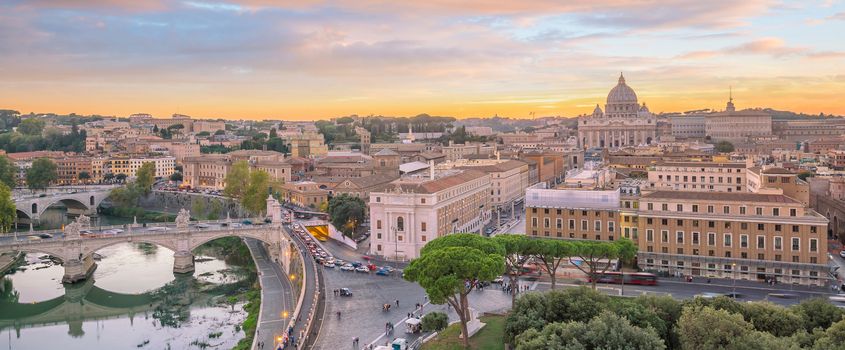 View of old town Rome skyline from Castel Sant'Angelo, Italy at sunset
