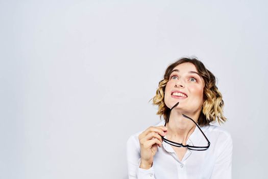 Woman business finance glasses work office light background portrait model. High quality photo