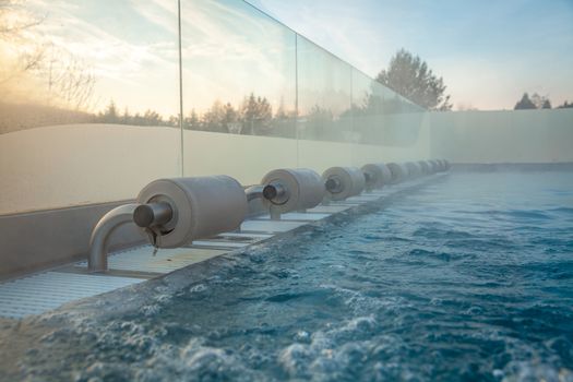 outdoor pool with water massage for relaxation and unwinding.