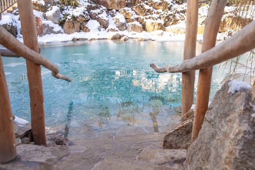 lake with ice water in winter for cooling after sauna.