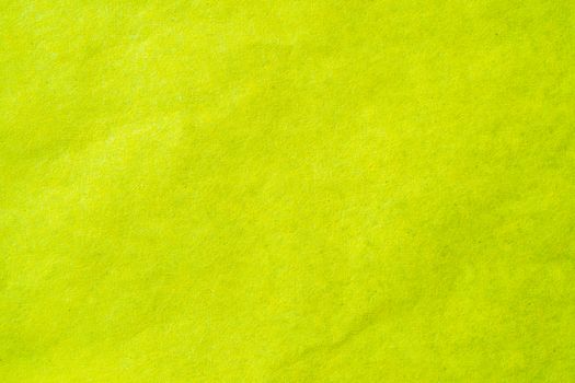 Yellow crumpled paper texture background.