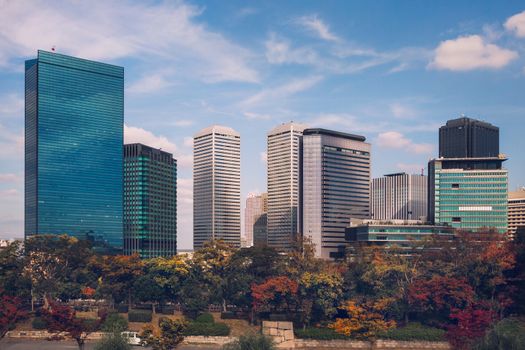 Autumn skyline of Osaka Business Park, viewed from Osaka Castle Park, Osaka, Japan