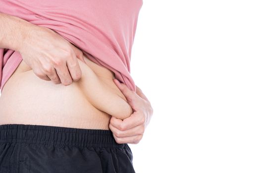 Fat man holding excessive fat belly, overweight fatty belly isolated on over white background. Diet lifestyle, weight loss, stomach muscle, healthy concept.