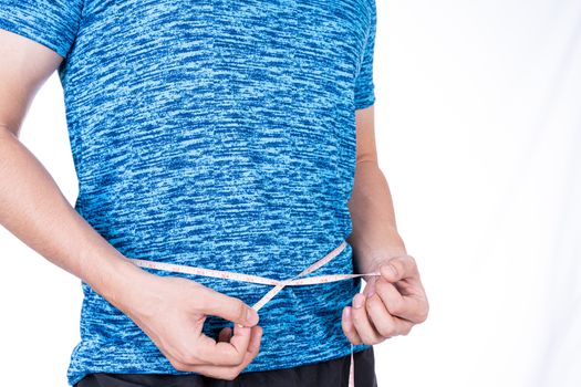 Chubby man measuring his waist with white measuring tape isolated on white background. Diet lifestyle, weight loss, stomach muscle, healthy concept.