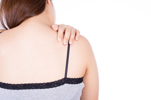 A woman feeling exhausted and suffering from shoulder and neck pain and injury on isolated white background. Health care and medical concept.