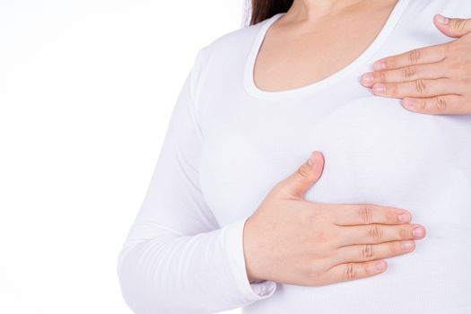 Woman hands doing breast self exam for checking lumps and signs of breast cancer isolated over white background. Medical, healthcare for advertising concept.
