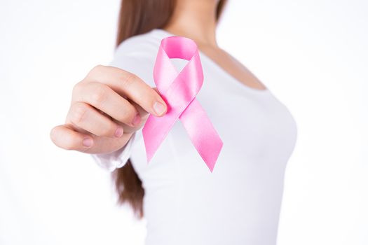 Breast cancer awareness ribbon on woman chest isolated over white background. Medical, healthcare for advertising concept.