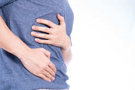 Man hand touching stomach, waist, or liver position isolated white background. Health care and medical concept.