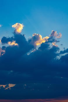 Heavy cloudy sky at sunset. A landscape of beautiful nature.