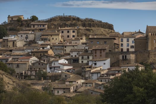 Murillo de Gallego, Spain - October 15, 2020: General view of the town of Murillo de Gallego with its picturesque little houses, province of Huesca, Pre-Pyrenees Aragon.