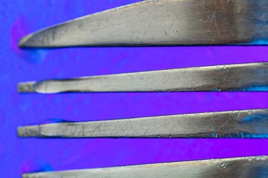 Abstract fork detail on colorful surface. Abstract background concept