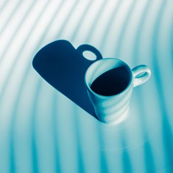 luxury coffee cup on blue and white background