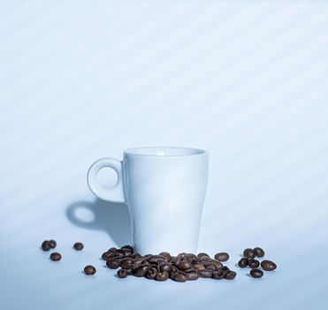 clean luxurycoffee cup on white background witn beans