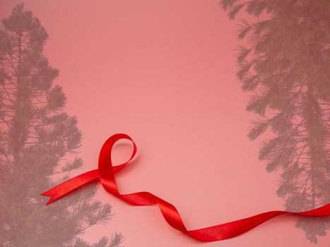 ribbon and christmas tree on Pink christmas background