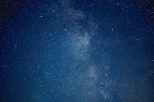 Milky way galaxy stars space dust in the universe, Long exposure photograph, with grain. Summer night sky Milkyway nightscape